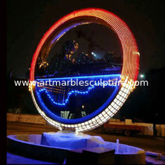 China Proyecto de escultura de anillos de acero inoxidable de gran tamaño, pintura de espejos y luz, proveedor de esculturas de acero inoxidable proveedor