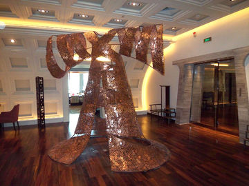 escultura de acero inoxidable con color bronce proveedor