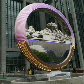 Proyecto de escultura de anillos de acero inoxidable de gran tamaño, pintura de espejos y luz, proveedor de esculturas de acero inoxidable proveedor